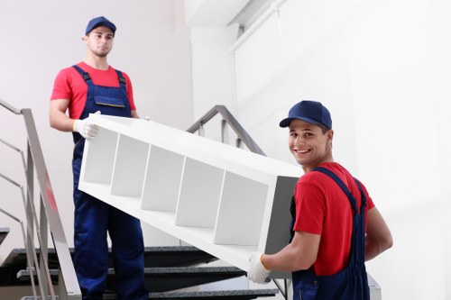 Storage staff using safety equipment in a secure warehouse environment