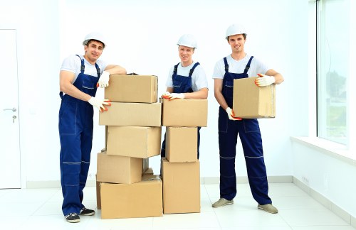 Protected sofas and tables in furniture storage in Willesden